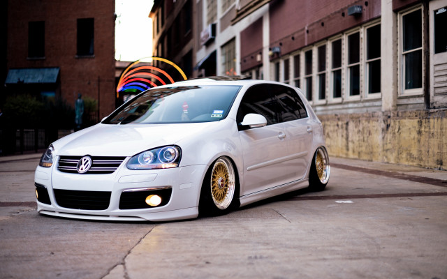 White car street building bike free wallpaper - medium preview image