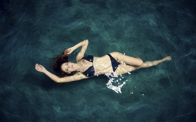 Woman bikini floating ocean surfboard free wallpaper - medium preview image