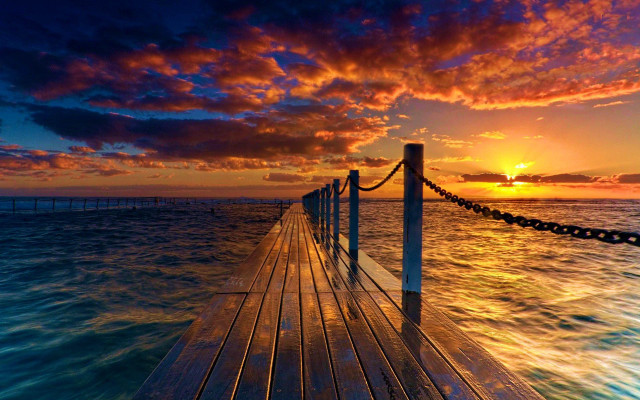 Sunset dock clouds water cityscape free wallpaper - medium preview image