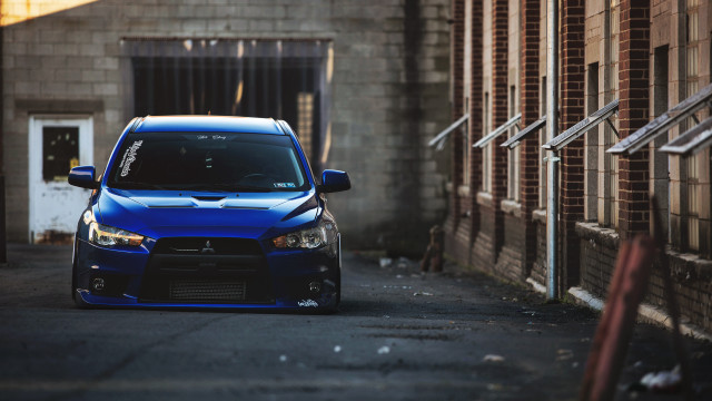 Blue car building street corner #3 free wallpaper - medium preview image