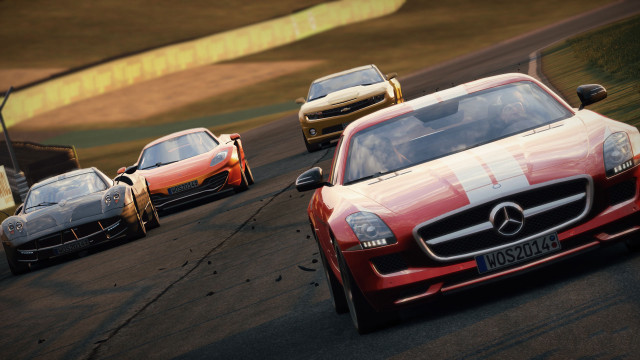 Three cars race track grass free wallpaper - medium preview image