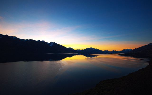 Lake mountains sunset cityscape clouds free wallpaper - medium preview image
