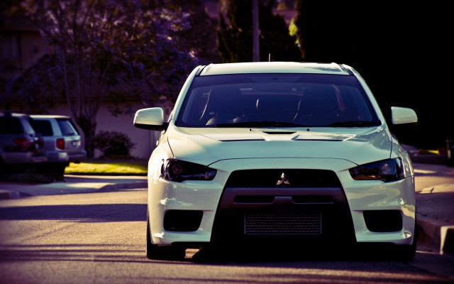 White car tilt shift building free wallpaper - medium preview image