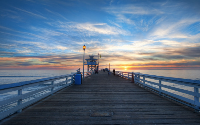 Pier lighthouse trashcan sunset clouds free wallpaper - medium preview image