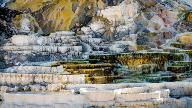 Large rocks waterfall mountain yellow free wallpaper - medium preview image