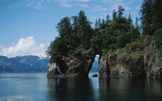 Large rock formation lake trees free wallpaper - medium preview image
