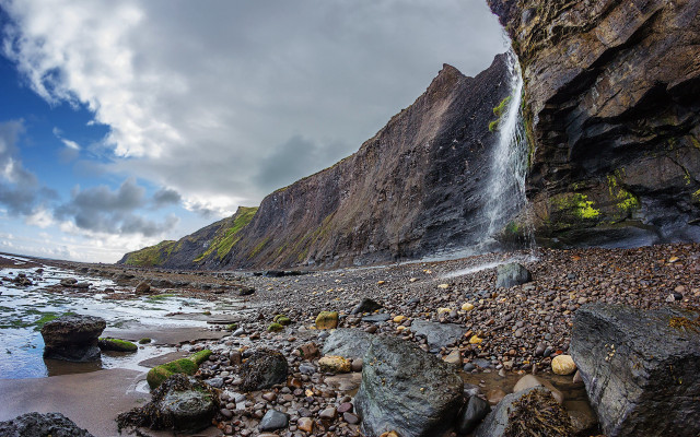 Waterfall cliff ocean cloudy day free wallpaper - medium preview image