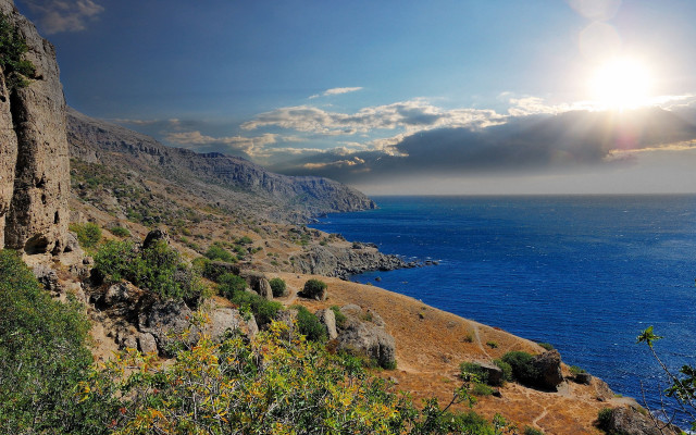 Cliff ocean sunrise mountains cityscape free wallpaper - medium preview image