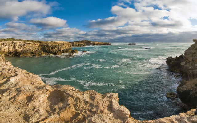 Rocky cliff ocean cloudy day free wallpaper - medium preview image