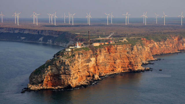 Cliff lighthouse windfarm ecological matte free wallpaper - medium preview image