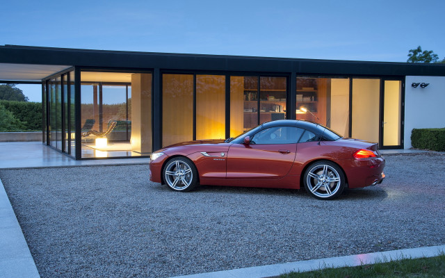 Red sports car night house free wallpaper - medium preview image