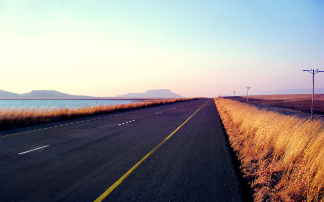 Road water mountain sky beach free wallpaper - medium preview image