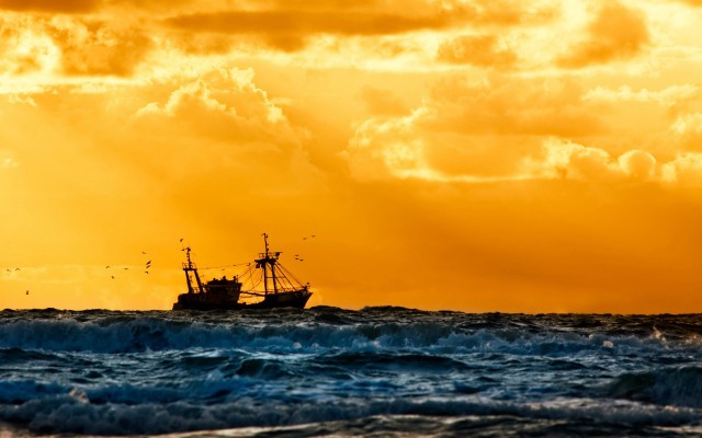 Boat ocean yellow sky clouds #2 free wallpaper - medium preview image