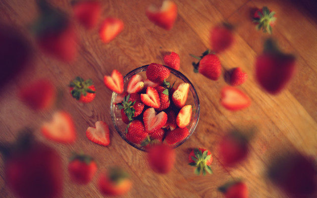 Strawberries wooden table scattered leaves free wallpaper - medium preview image