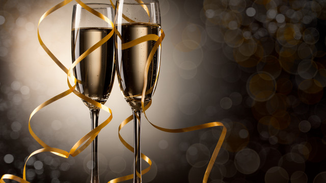 Champagne flutes gold ribbon bokeh free wallpaper - medium preview image