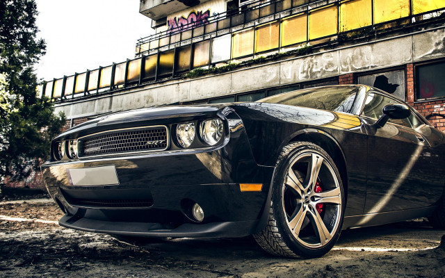 Black sports car graffiti building #2 free wallpaper - medium preview image