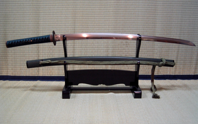 Sword stand knife bronze sculpture free wallpaper - medium preview image