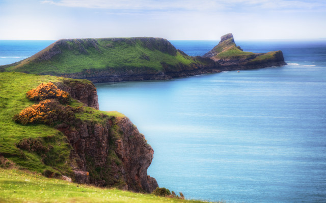 Grassy hill lake island sky free wallpaper - medium preview image