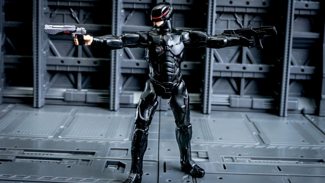 Toy figure cybernetic mecha weapon free wallpaper - medium preview image