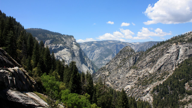 Mountain range forests rocks clouds free wallpaper - medium preview image