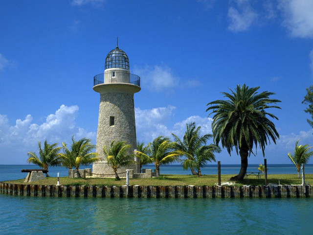 Lighthouse island palm trees water free wallpaper - medium preview image