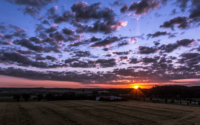 Sunset clouds field trees cars free wallpaper - medium preview image