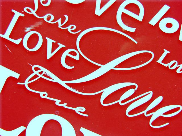 Red sign love is all free wallpaper - medium preview image
