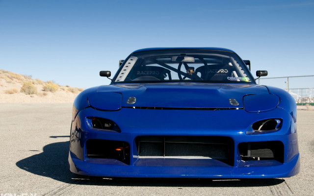Blue sports car parking lot free wallpaper - medium preview image