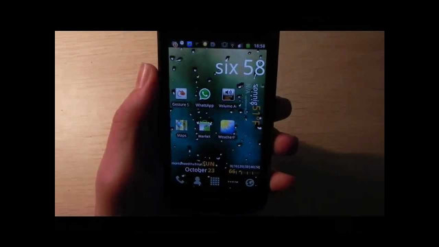 Person holding smartphone screen six free wallpaper - medium preview image