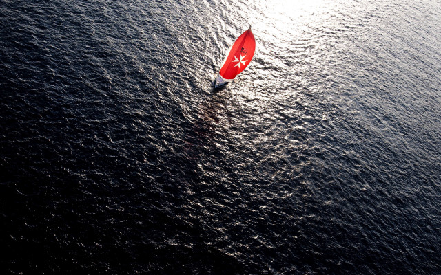 Red sailboat shoreline night sky free wallpaper - medium preview image