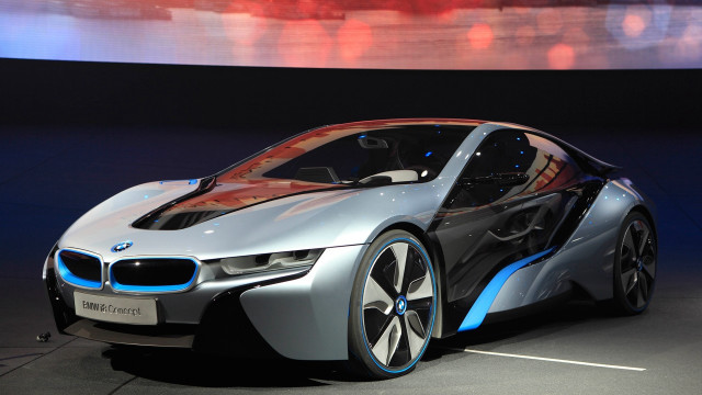 Silver blue futuristic showroom car free wallpaper - medium preview image