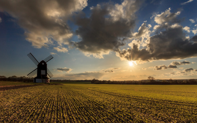 Windmill field cloudy sunset cityscape free wallpaper - medium preview image
