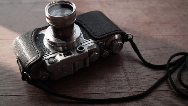 Camera lens table cord leather free wallpaper - medium preview image