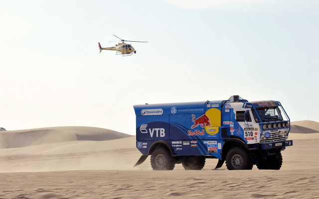 Desert truck helicopter serial art free wallpaper - medium preview image