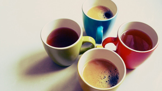 Four tea cups white tabletop free wallpaper - medium preview image