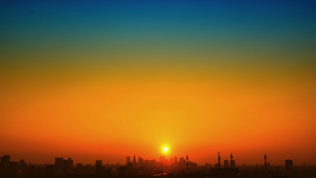 Sunset cityscape plane dusk silhouette free wallpaper - medium preview image