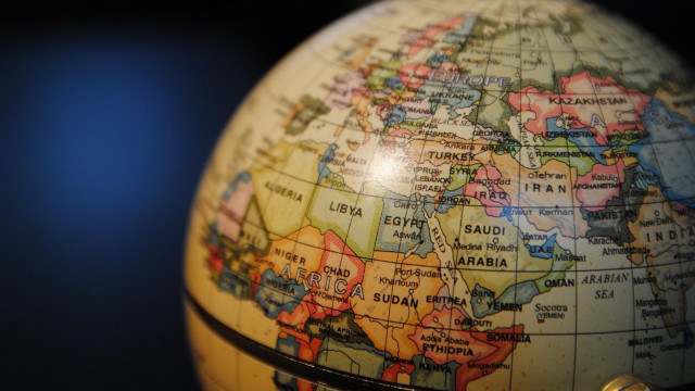 Globe typographic tiltshift global blur free wallpaper - medium preview image