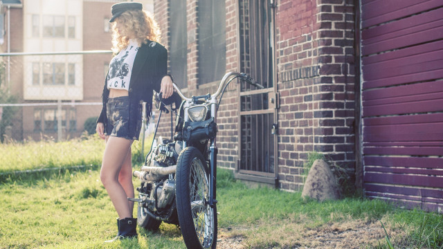 Woman motorcycle brick wall purple free wallpaper - medium preview image