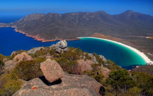Mountain beach water rocks bushes free wallpaper - medium preview image