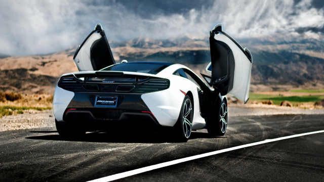 White sports car mountains clouds #2 free wallpaper - medium preview image