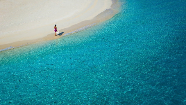Beach water boat sand sky free wallpaper - medium preview image