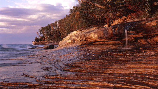 Rocky beach waterfall trees cloudy free wallpaper - medium preview image