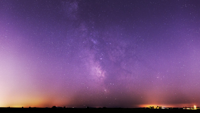 Purple sky stars buildings astronaut free wallpaper - medium preview image