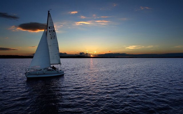 Sailboat sunset water urban reflection free wallpaper - medium preview image