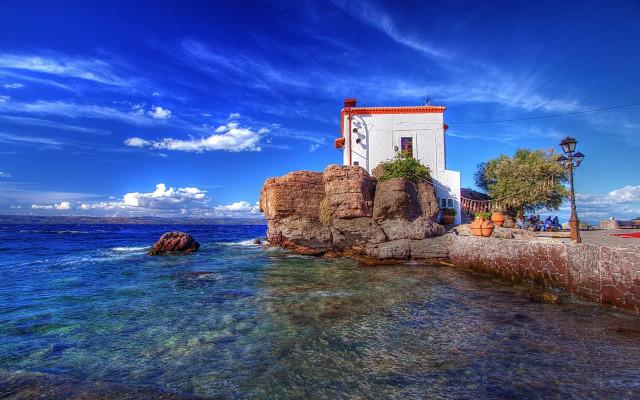 Lighthouse rock ocean blue sky free wallpaper - medium preview image