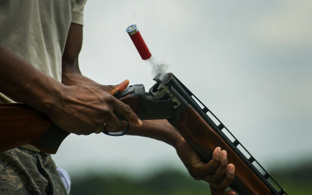 Man gun red handle headshot free wallpaper - medium preview image