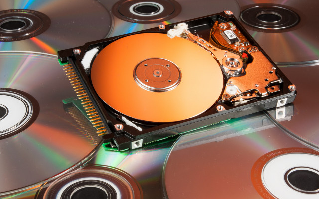 Hard drive discs orange technology free wallpaper - medium preview image