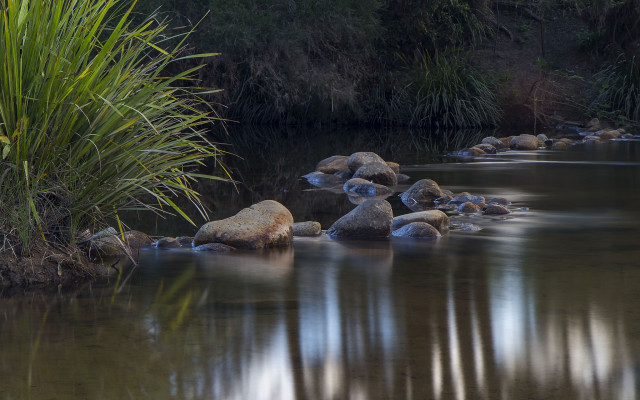 River rocks grass reflection clouds free wallpaper - medium preview image