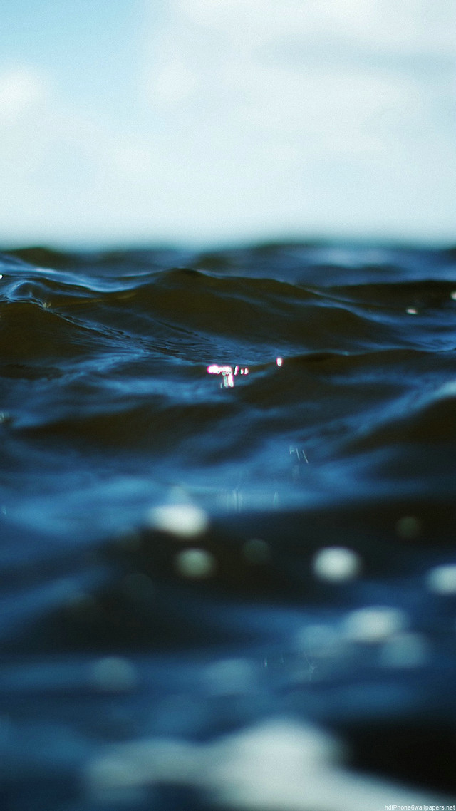 Blurry person water surfboard background free wallpaper - medium preview image