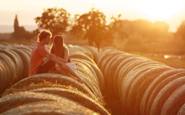 Haybale couple autumn sunset romantic free wallpaper - medium preview image